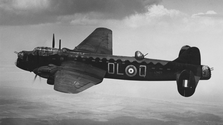 black and white photo of avro manchester in flight