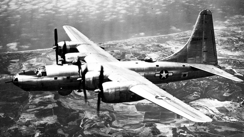black and white photo of Consolidated B-32 Dominator in flight