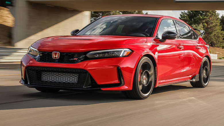 Honda Civic Type R sedan driving down a freeway