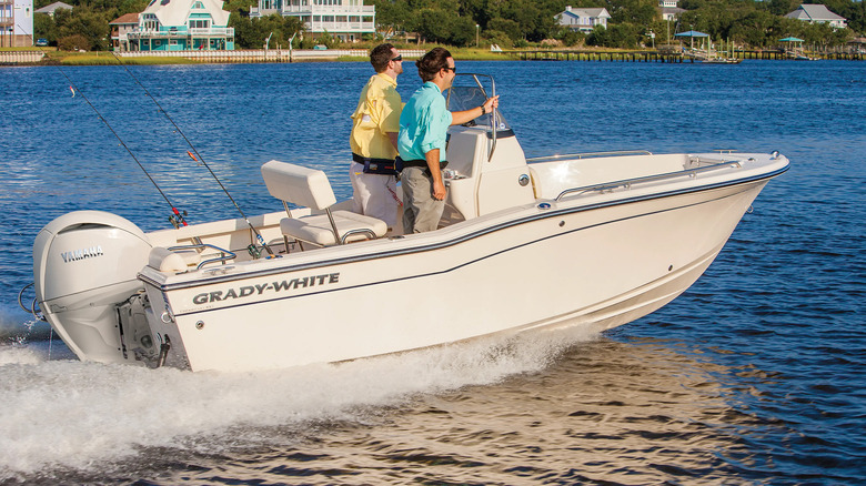 A Grady-White Fisherman 1800 with two men on it