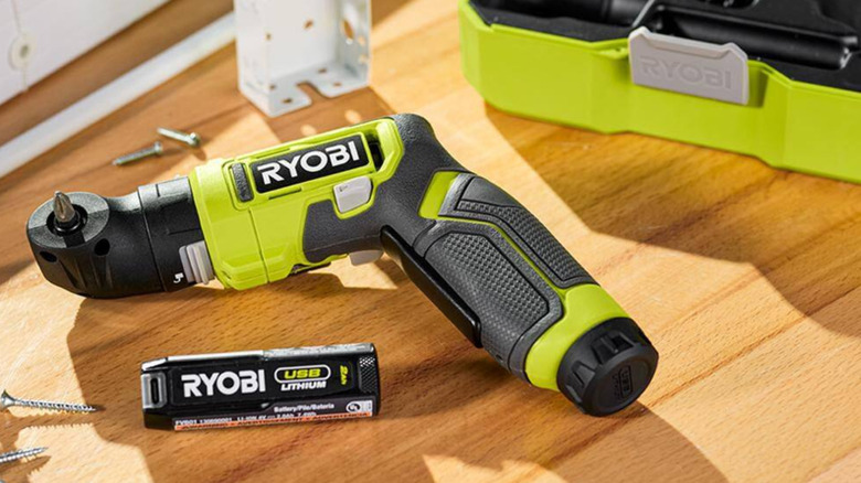 Ryobi's USB Lithium Multi-Head Screwdriver next to its box.