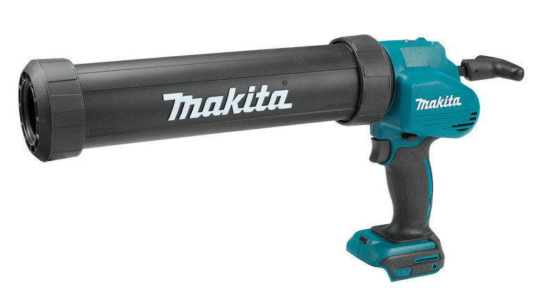A Makita electric caulk gun stock image on a white background