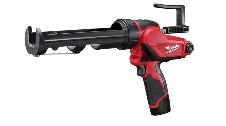 A Milwaukee M12 Fuel electric caulk gun stock image