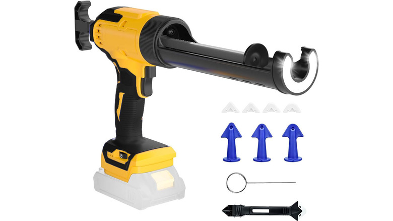 A stock image of an electric caulk gun with several tips and other accessories