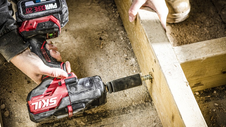 using Skil impact driver