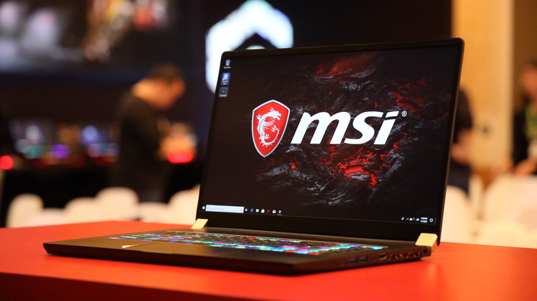 MSI laptop on a red table