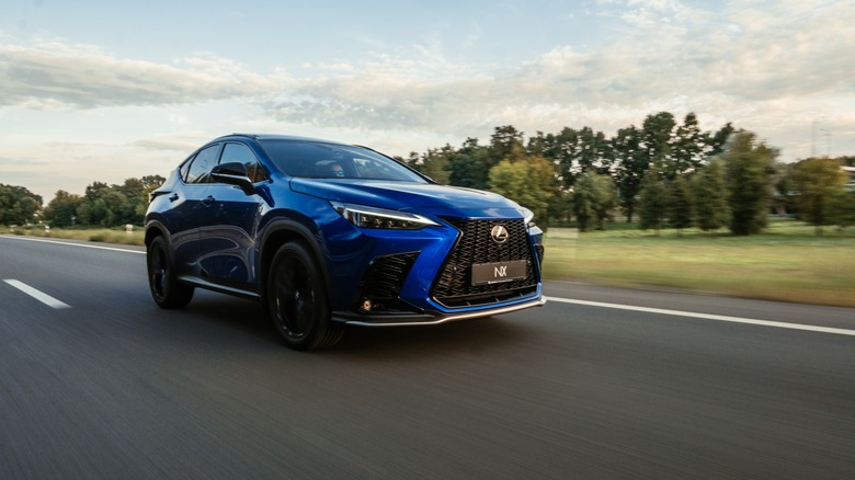 Blue Lexus NX 300 country road