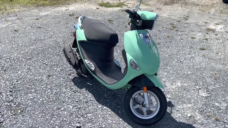 Genuine Buddy on gravel lot