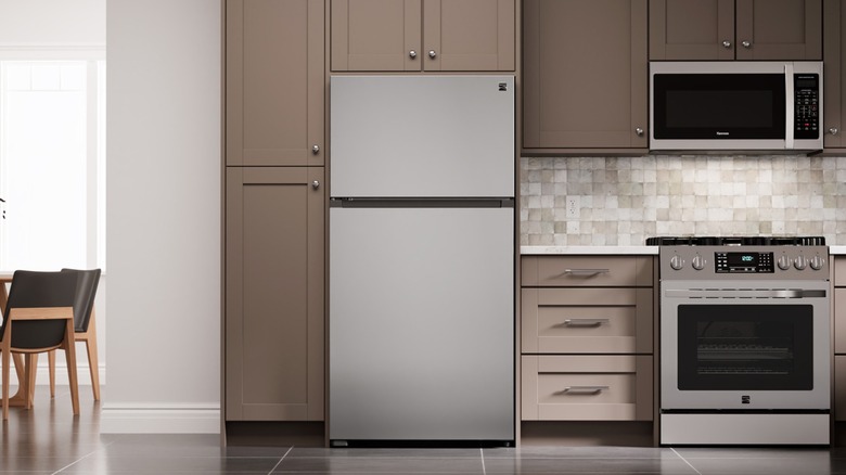 A Kenmore fridge in a regular kitchen