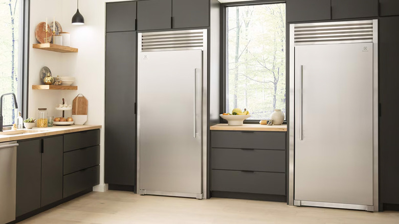 Two Electrolux single-door fridges next to each other