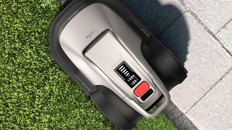 The Eufy E18 robot mower on a lawn, seen from above/
