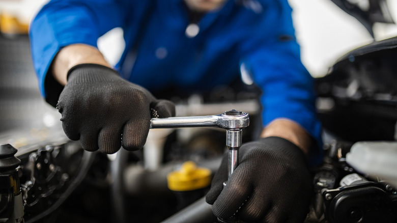 Socket Wrench in use on a car