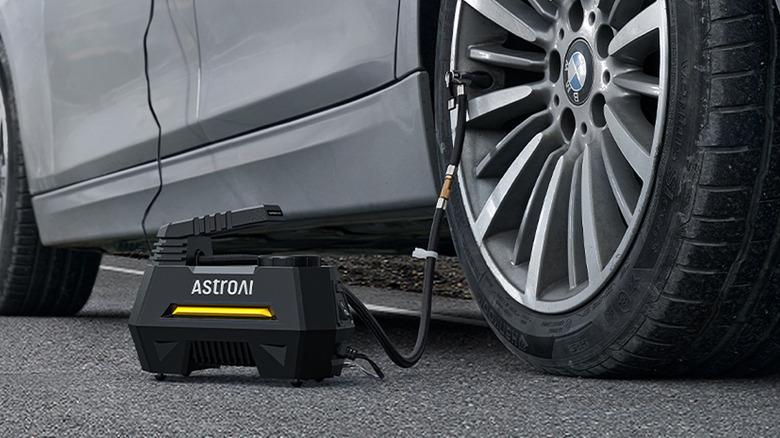 AstroAI Tire Inflator in Use with BMW Car