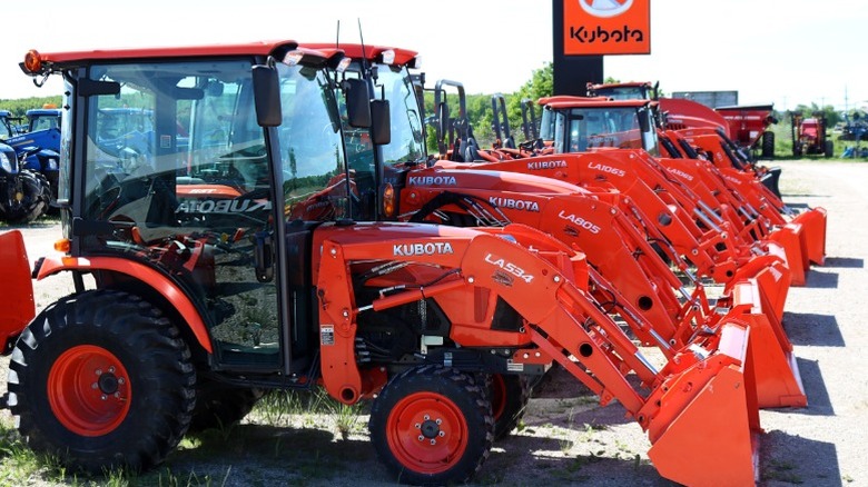 A row of Kubota tractors