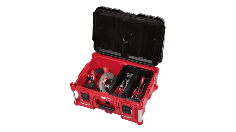An open Packout Large Tool Box with a tray and some tools inside on a white background