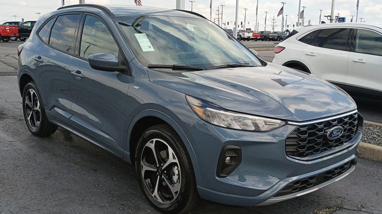 Gray current-generation Ford Escape SUV seen from right front