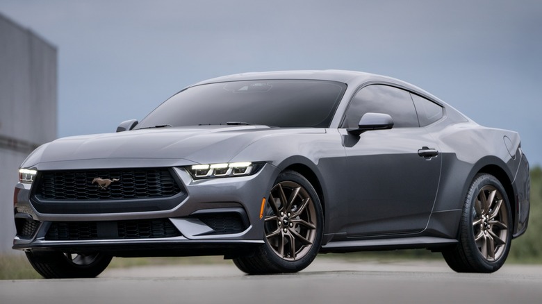 Gray current-generation Ford Mustang seen from front left