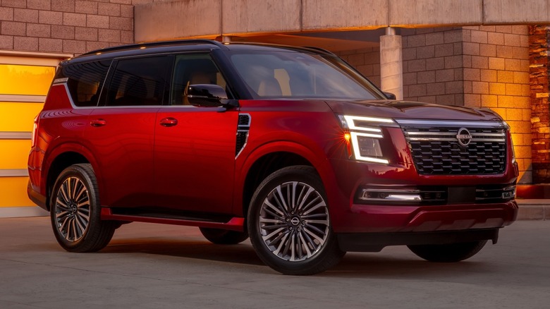 2025 Nissan Armada Platinum Reserve parked in front of a building