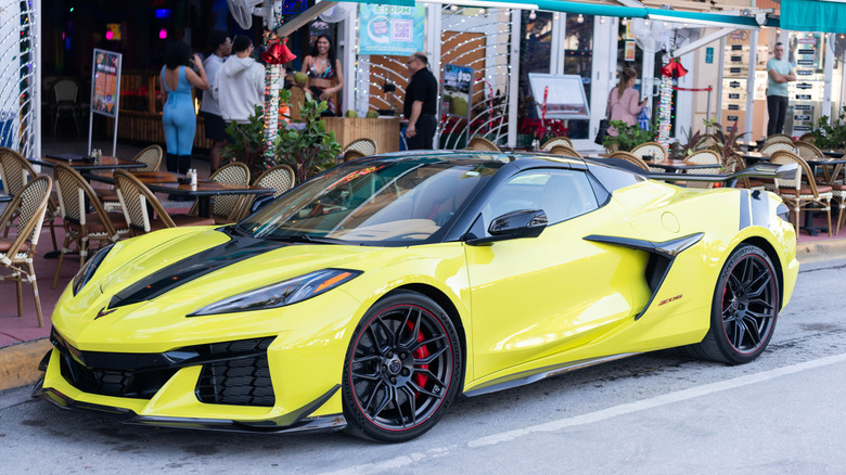 Yellow 2022 Chevrolet Corvette parked at a roadside