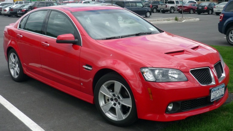 Red 2008 Pontiac G8 GT in a parking lot