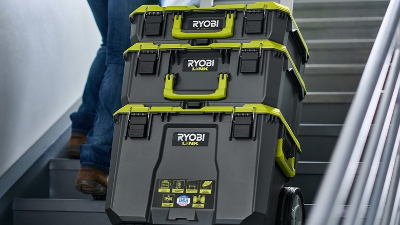 Ryobi toolboxes getting pulled up stairs