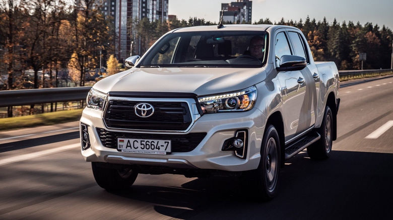 Toyota Hilux driving on the road