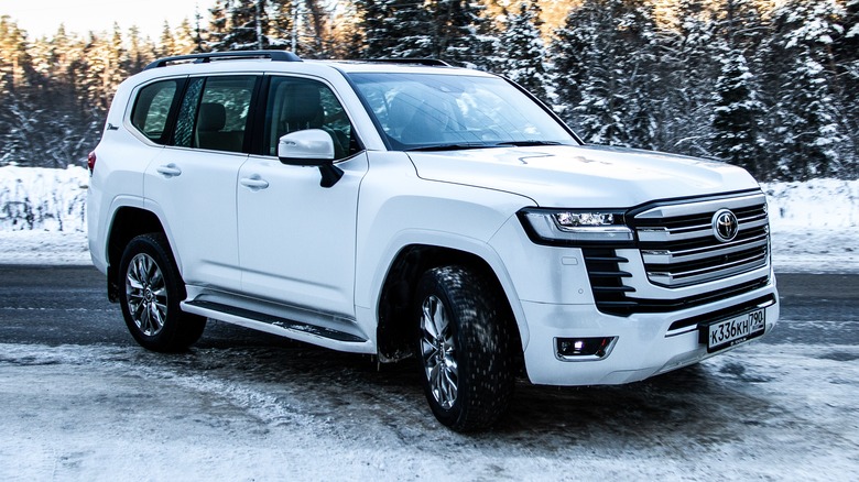 white toyota land cruiser j300