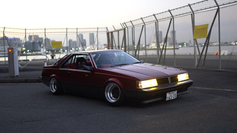 Red Toyota Corona Coupe T140 RWD 