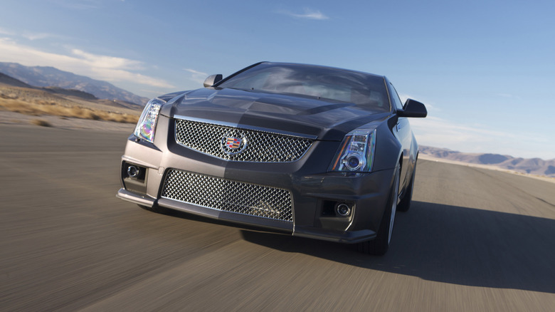 Grey Cadillac CTS-V driving on desert road