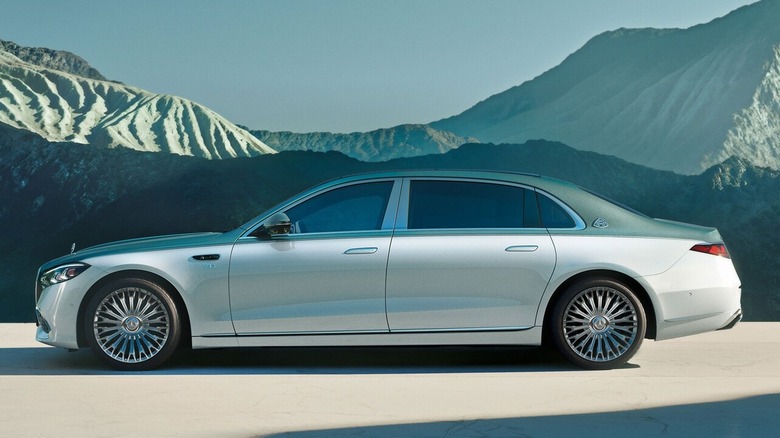 Mercedes AMG Maybach S-Class parked in front of mountain range