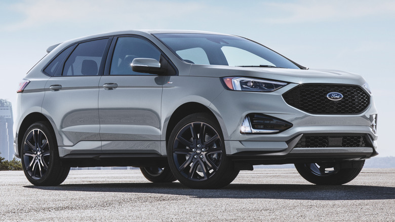 Silver Ford Edge parked on asphalt