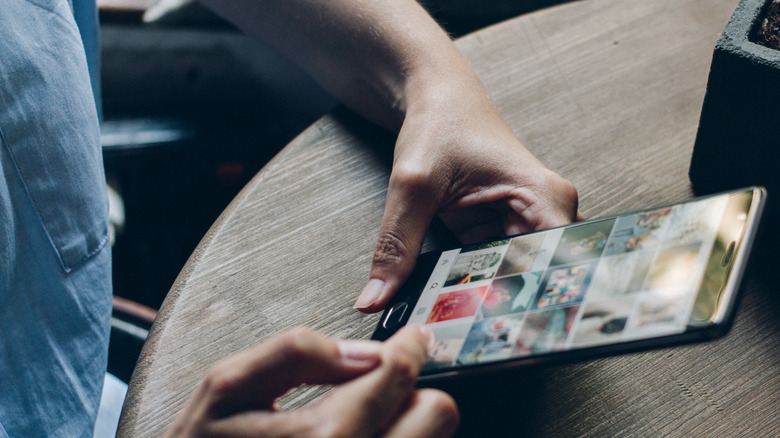 woman scrolling Instagram on Android