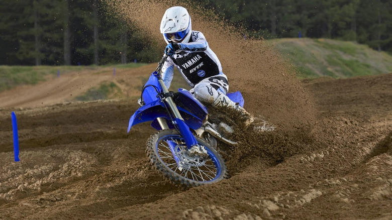 Biker kicking up dirt with 2026 YZ125