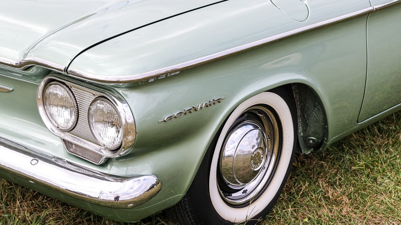 Chevrolet Corvair parked on grass