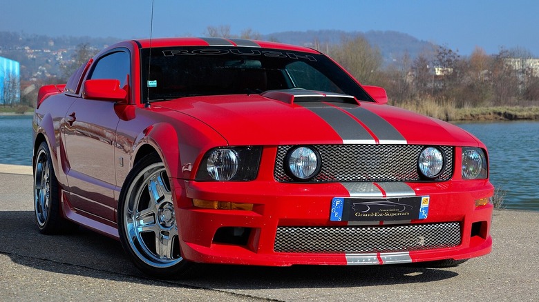 Roush Mustang in front of lake