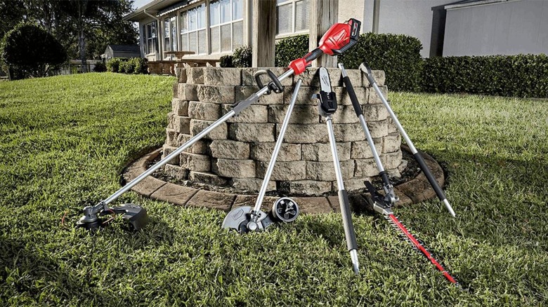 Tools laying on blocks in yard