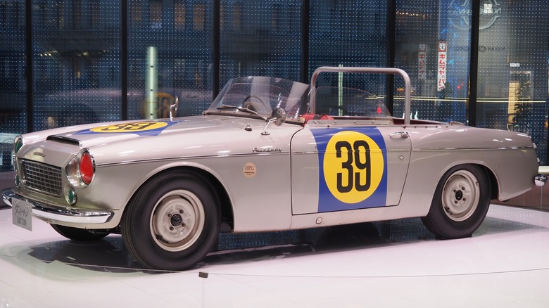 Silver number 39 Datsun Fairlady 1500 on display