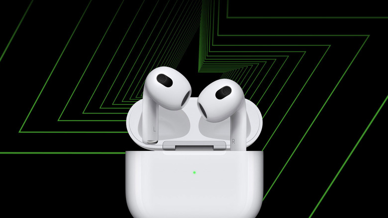 AirPods Generation 3 black background with green lines.