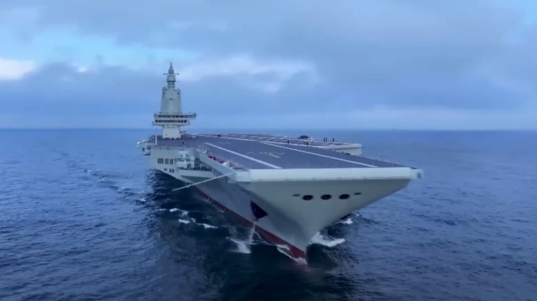 The Fujian, China's third aircraft carrier, embarks on its maiden voyage.