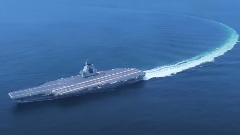 A bird's eye view shows the Fujian embarking on its maiden voyage.