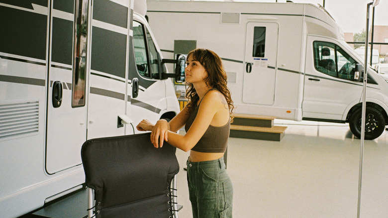 woman in camper showroom