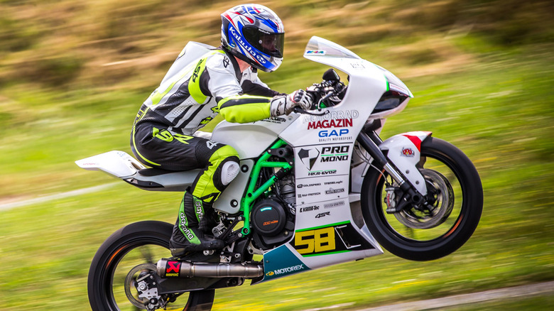 Krämer Motorcycle riding wheelie on track