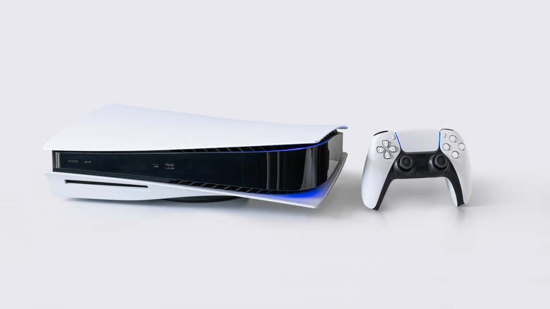 PS5 lying flat with DualSense