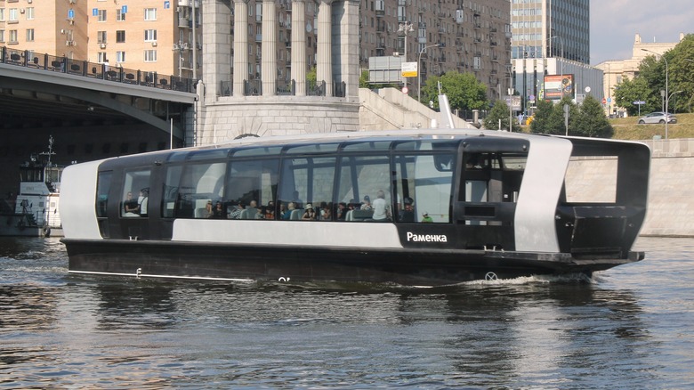 large electric passenger boat on water