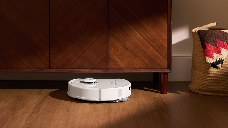 Roborock vacuum passing a credenza