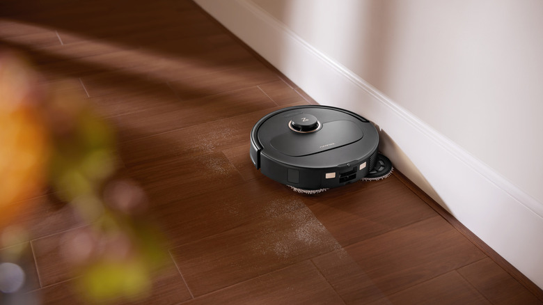Roborock vacuum scuttling along a skirting board