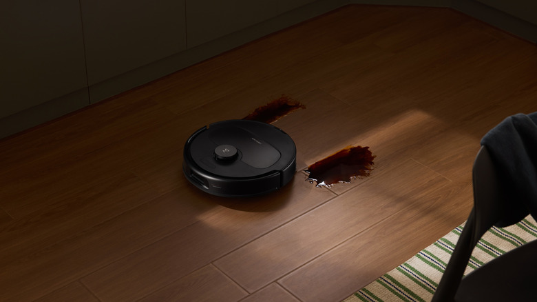 Roborock vacuum mopping up wine