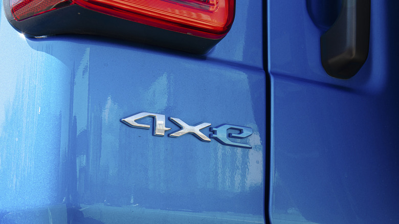 Detail view of "4xE" badging on Jeep Wrangler PHEV