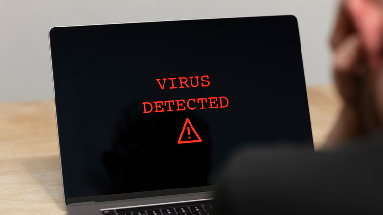 Virus detected message on laptop