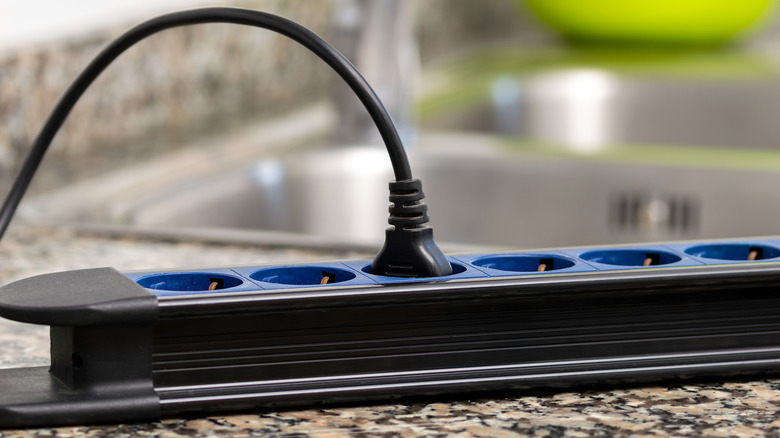 Extension cord on kitchen countertop